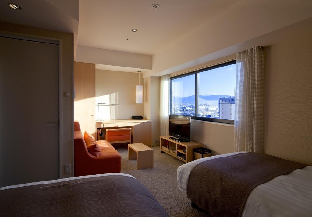 Cocochee Hotel Numazu Quarto foto