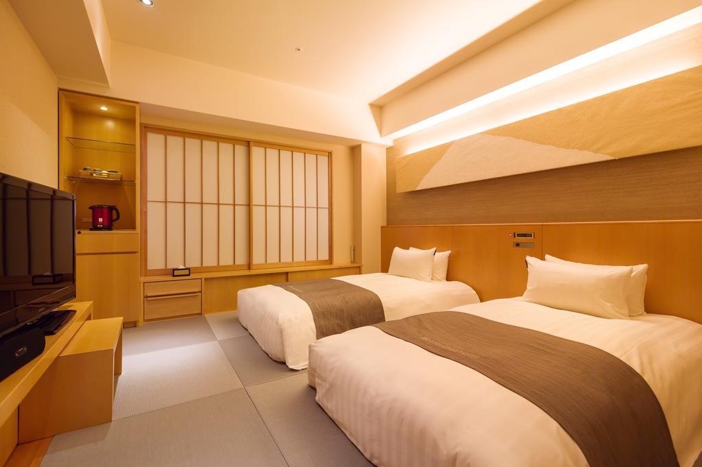 Cocochee Hotel Numazu Quarto foto